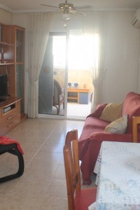 Apartamento en Torrevieja Atico a tan solo 200m de la playa del Cura , 3 dormitorios .